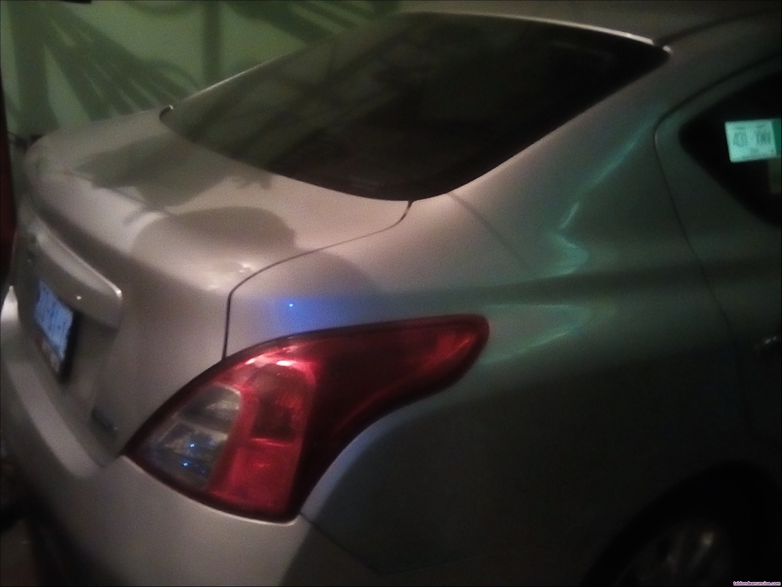 Nissan versa gris claro sense modelo